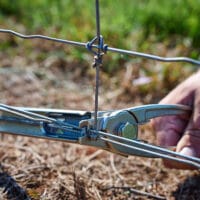 Jambro ring fastener tool for clipping fences